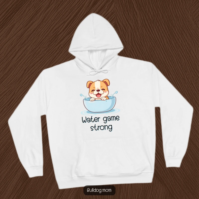Funny bulldog cub hoodie design featuring a joyful puppy giggling enthusiastically while splashing in a water bowl, embodying pure, wet fun.