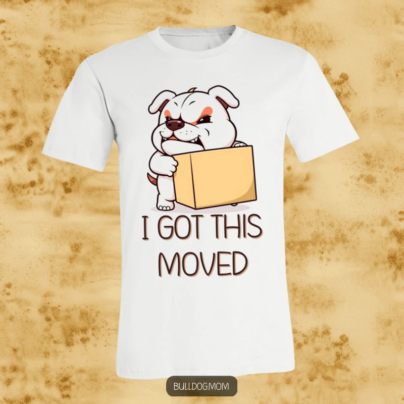 Funny Moving Bulldog T-Shirt: A strong bulldog with a confident grin pushes a large box, representing hard work and progress.